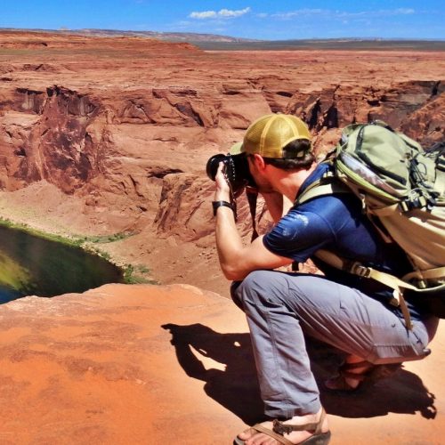 Jacob Butera taking a photo of the Grand Canyon