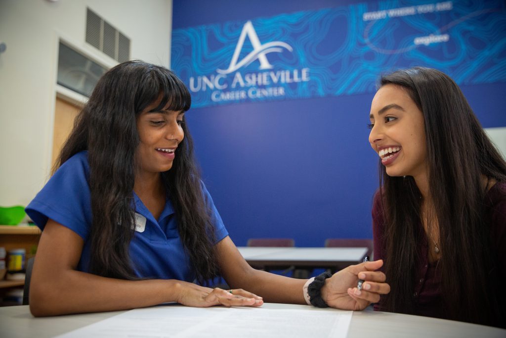 A student talking to a Career Center counselor