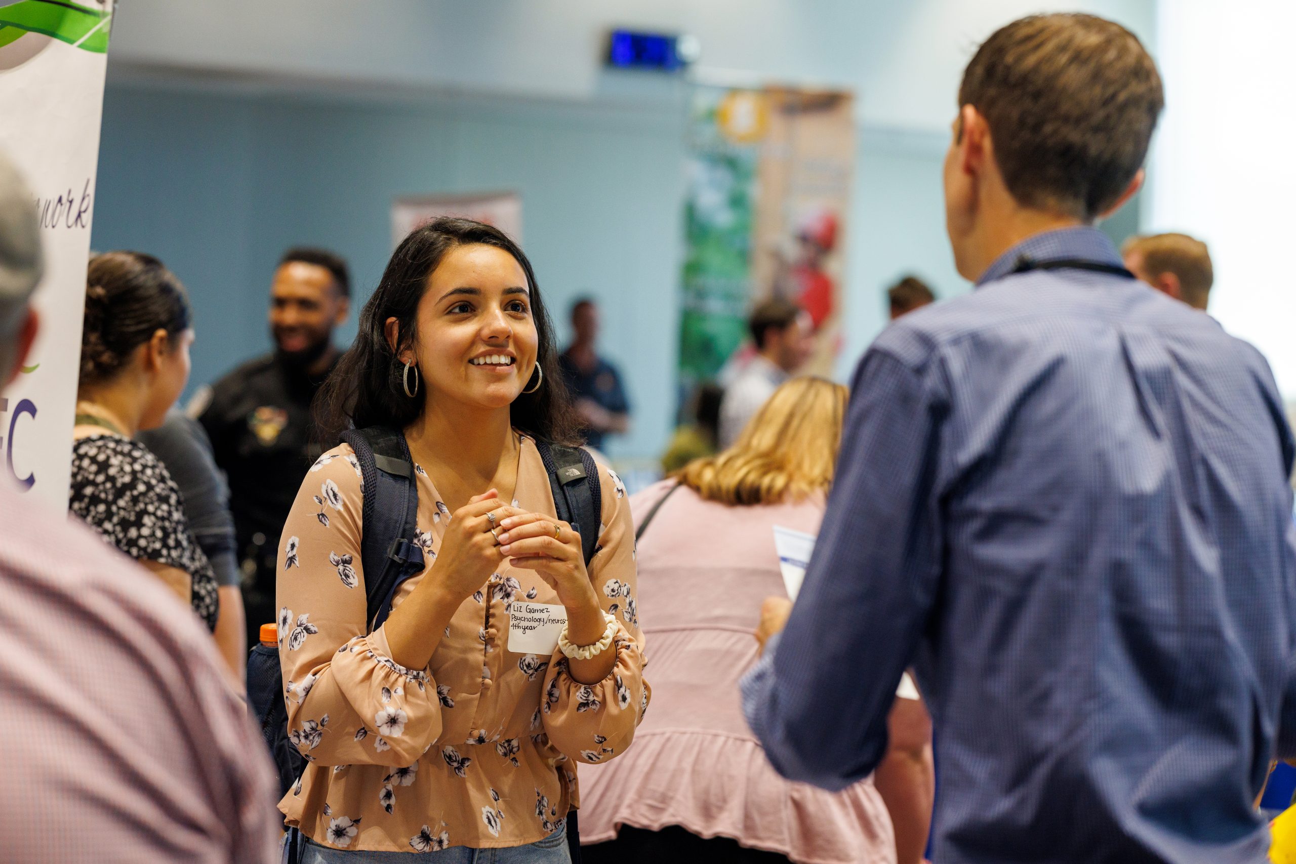 A student talking to a Career Center coach