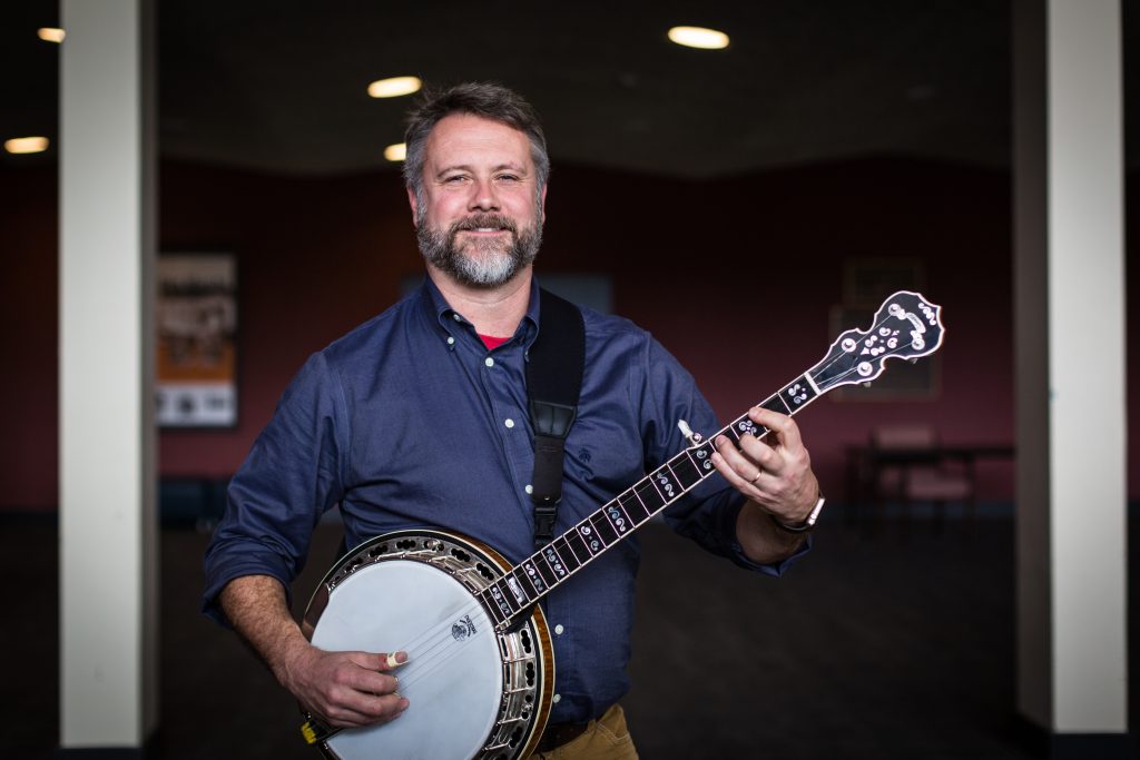 Toby King with a banjo