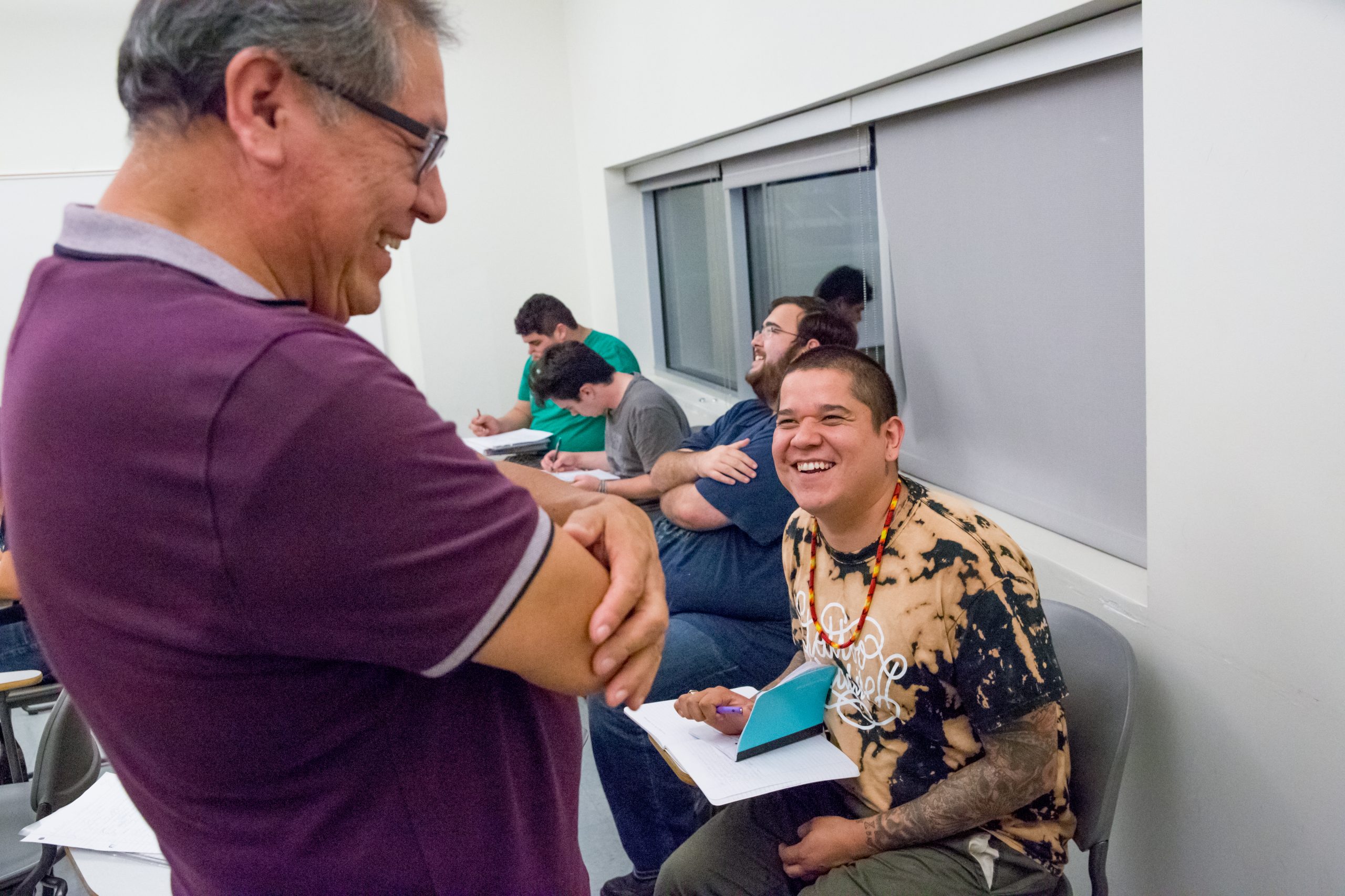 A professor and a student in a Cherokee language class